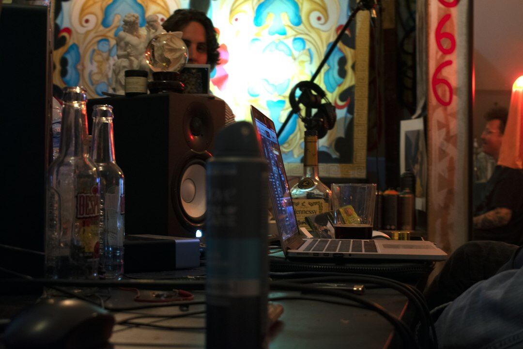 Small creative team recording a podcast episode together